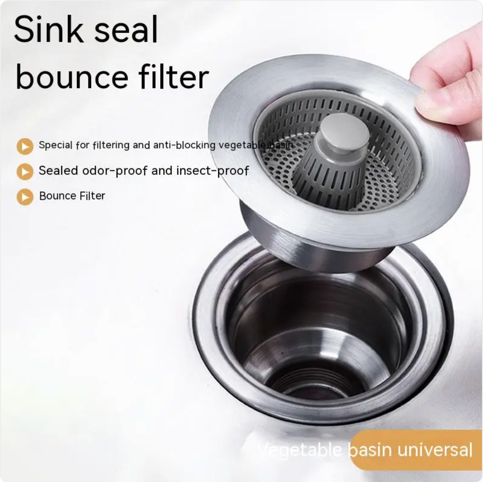 Steel sink debris catcher in use, filtering food scraps and preventing clogs in the drain.