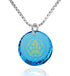 Yogi Serenity Charm featuring a blue cubic zirconia necklace with gold inscription for mindfulness and tranquility.