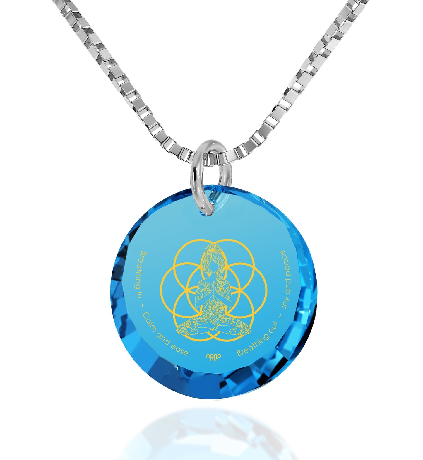 Yogi Serenity Charm necklace featuring blue cubic zirconia with gold inscription for mindfulness and tranquility.