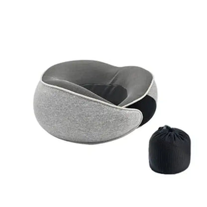 Gray travel neck pillow with a black drawstring bag on a white background
