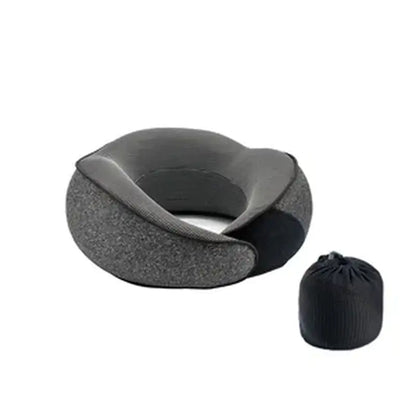 Gray travel neck pillow with a black drawstring bag on a white background